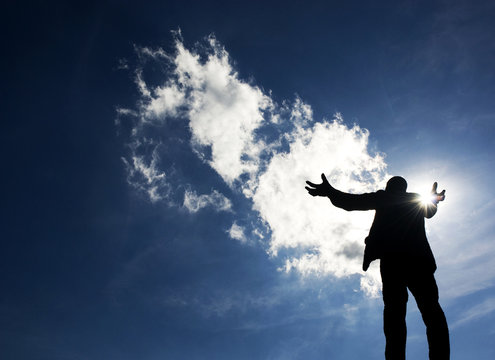 Raised arms statue