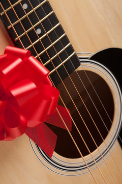 Guitar Strings with Red Ribbon
