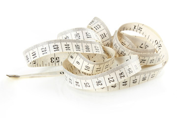 Curled white measuring tape