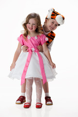 Children in masquerade clothing on isolated background