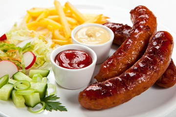 Grilled sausages and vegetables