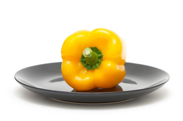Yellow pepper on a plate
