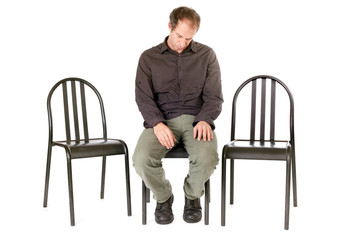 Fototapeta premium alone depressed man sitting on chair