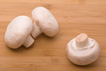 Fresh mushrooms on a chopping board