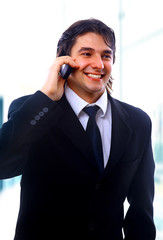 Businessman making a phone call...