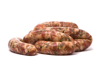 Raw sausages on white background