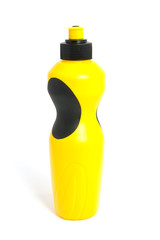 Yellow plastic drink bottle over white background
