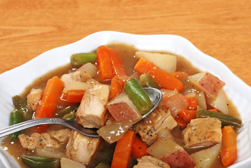 spoon in chicken stew