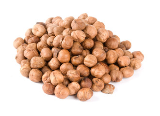 heap of hazelnuts isolated on white