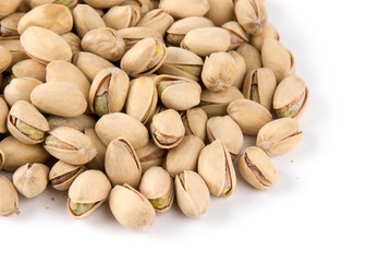 salted pistachios isolated on white background