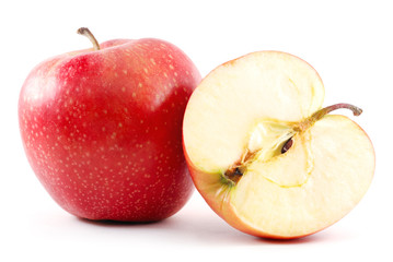 red apple and its half isolated on white