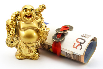Gold laughing Buddha with money and chinese coins