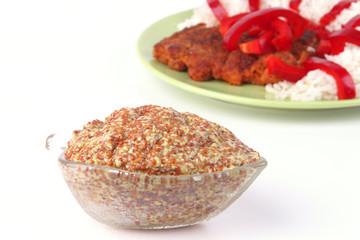 roast meat with rice and mustard