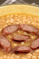 white beans with sausage close up