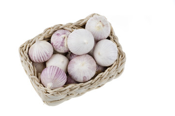 Obraz na płótnie Canvas Garlic basket over white isolated