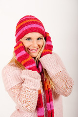 Young funny sexy winter woman in warm gloves