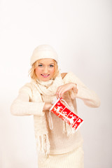 Young funny sexy winter woman with christmas present