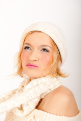 Young funny sexy winter woman in hat and scarf