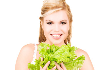 happy woman with lettuce