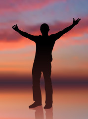man standing with sunset internet background