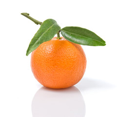 Tangerine with green leaves isolated on white