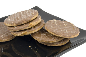 choclate cookies on plate isolated on white background