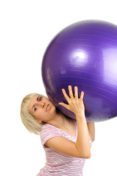 young woman with flexy ball isolated on white