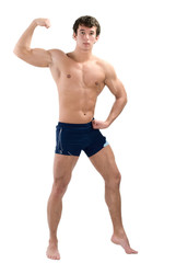 Young muscular man posing isolated on white