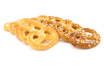 Knot-shaped biscuit with sugar and sesame