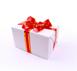 one white gift box with red ribbon and bow isolated