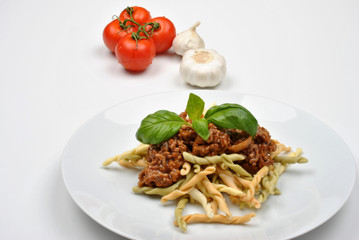 home made pasta with mince sauce and basil