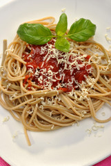 home made pasta with mince sauce and basil