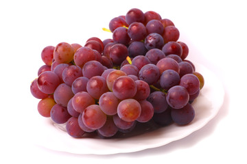 Grapes on the white plate