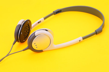 Headphones on yellow