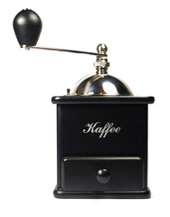 Vintage coffee grinder isolated on white