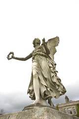 winged woman sculpture