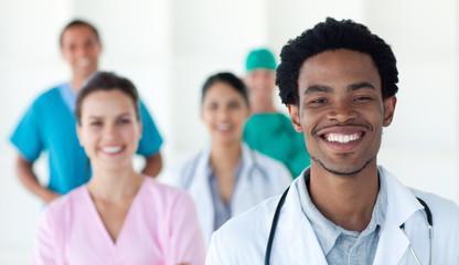 Multi-ethnic medical people smiling at the camera