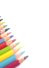 Naklejka premium color pencils close-up isolated on white background
