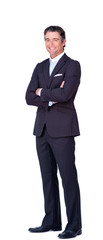 Attractive businessman with folded arms