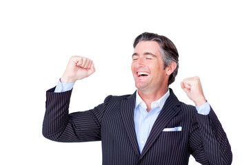 Successful businessman punching the air in celebration