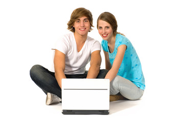 Couple using laptop