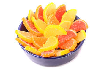 Fruit candy on a blue plate