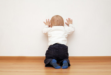 little boy near the wall