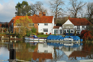 Fototapeta premium Traditional English Riverside House in early Winter