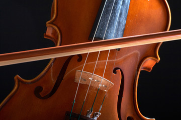 vintage violin over dark background