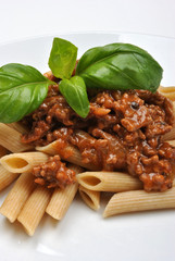 home made pasta with mince sauce and basil