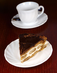 Sweet cake with cup of coffee