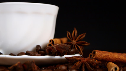 Cup of coffee with cinnamon and badian