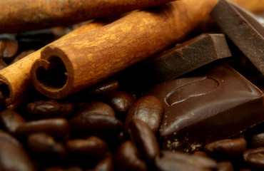 Coffee beans with cinnamon and chocolate