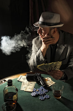 gangster smoking and play poker